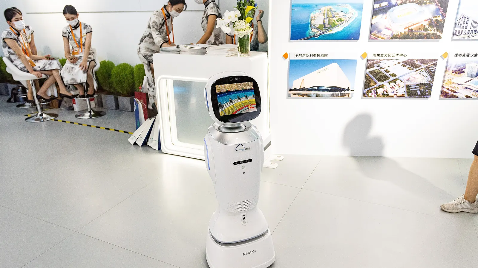 A service robot at a trade fair reception desk